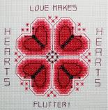 Hearts Flutter Stitched on 14ct white aida with DMC floss. Stitch ct: 60 x 60  SRP $6.00